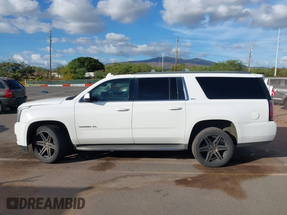 2015 GMC Yukon XL SLT with VIN 1GKS1HKC2FR612690, listed as a IAAI auction lot 41234188 with 113,830 mi miles. Bid and sale history available at carsss.com. Image 14.