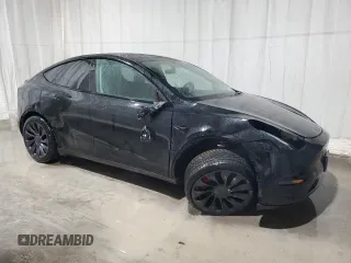 2022 Tesla Model Y Performance with VIN 7SAYGDEF3NF453267, listed as a Copart auction lot 53787615 with 82,452 mi miles and Salvage Title. Bid and sale history available at DreamBid. Image 4.