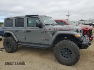 2019 Jeep Wrangler Unlimited Rubicon with VIN 1C4HJXFG6KW661609, listed as a Copart auction lot 55527005 with 25,302 mi miles and Salvage title. Bid and sale history available at DreamBid. Image 4.