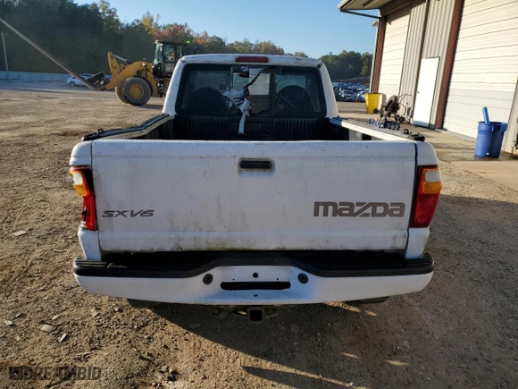 2001 Mazda B-Series 2WD Truck DS with VIN 4F4YR12U41TM25842, listed as a Copart auction lot 76827864 with 252,323 mi miles and Salvage Title. Bid and sale history available at carsss.com. Image 6.