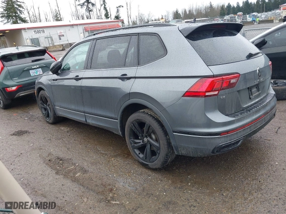 2023 Volkswagen Tiguan SE R-Line Black with VIN 3VVCB7AX0PM132194, listed as a IAAI auction lot 41594049 with 15,080 mi miles. Bid and sale history available at carsss.com. Image 3.