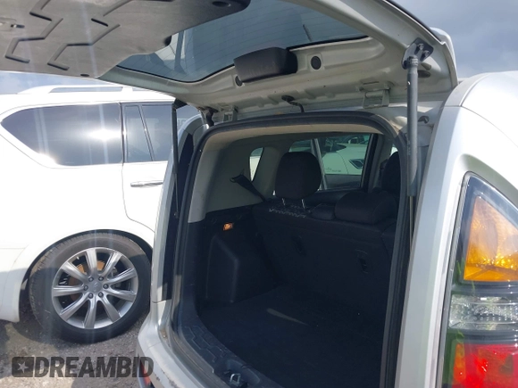 2011 Kia Soul + with VIN KNDJT2A2XB7705227, listed as a IAAI auction lot 41942432 with 293,320 mi miles. Bid and sale history available at carsss.com. Image 13.