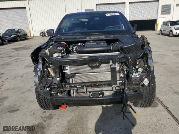 2023 Nissan Frontier SV with VIN 1N6ED1EJXPN659604, listed as a Copart auction lot 87003954 with 10,097 mi miles and Salvage Title. Bid and sale history available at carsss.com. Image 5.