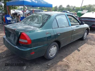 1998 Mitsubishi Mirage DE z VIN JA3AY26A2WU001675, wystawiony jako IAAI lot #42484995 z przebiegiem 89 680 mil mil oraz . Historia ofert i sprzedaży dostępna na DreamBid. Obrazek 4.