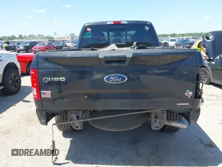 2015 Ford F-150 XLT with VIN 1FTFX1EF1FFC06037, listed as a IAAI auction lot 42525664 with 269,216 mi miles and . Bid and sale history available at DreamBid. Image 16.