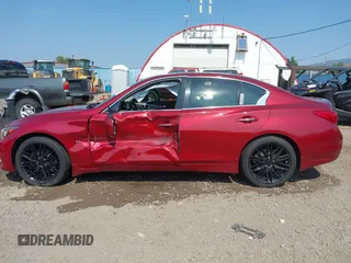 2015 Infiniti Q50 z VIN JN1BV7AR3FM419724, wystawiony jako IAAI lot #40104971 z przebiegiem 56 736 mil mil oraz . Historia ofert i sprzedaży dostępna na DreamBid. Obrazek 14.