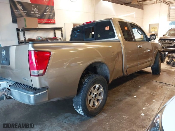 2004 Nissan Titan XE with VIN 1N6AA06A24N553627, listed as a IAAI auction lot 41427471 with 307,124 mi miles. Bid and sale history available at carsss.com. Image 4.