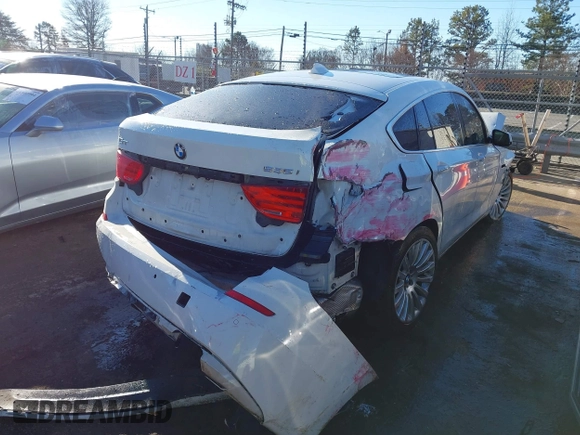 2013 BMW 5 Series GT 535i xDrive with VIN WBASP2C55DC339183, listed as a IAAI auction lot 41359533 with 144,020 mi miles. Bid and sale history available at carsss.com. Image 4.