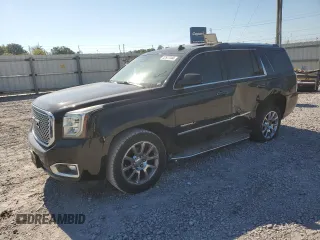 2015 GMC Yukon Denali with VIN 1GKS2CKJ9FR173812, listed as a Copart auction lot 72577144 with 207,940 mi miles and Salvage Title. Bid and sale history available at carsss.com. Image 1.