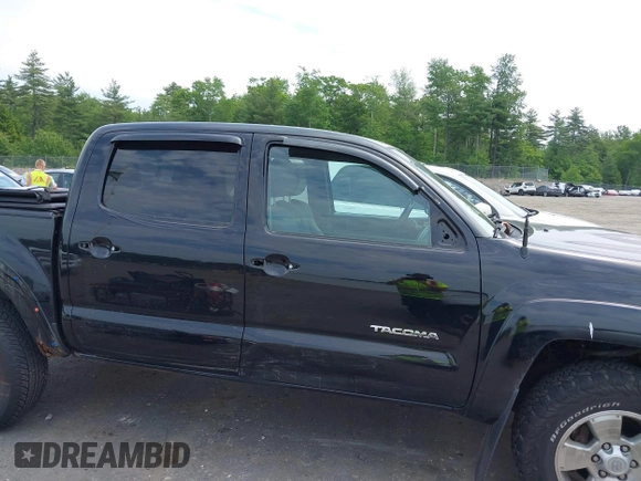 2013 Toyota Tacoma with VIN 3TMLU4EN4DM117239, listed as a IAAI auction lot 42494359 with 239,635 mi miles and . Bid and sale history available at DreamBid. Image 14.