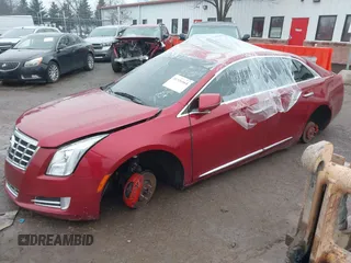 2013 Cadillac XTS Luxury with VIN 2G61R5S30D9157654, listed as a IAAI auction lot 41336844 with 159,419 mi miles and . Bid and sale history available at DreamBid. Image 2.