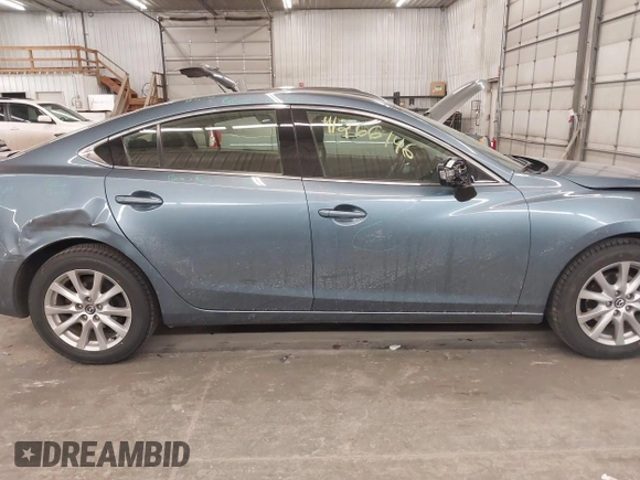 2015 Mazda 6 i Sport with VIN JM1GJ1U65F1170793, listed as a IAAI auction lot 41266146 with 125,701 mi miles and . Bid and sale history available at carsss.com. Image 14.