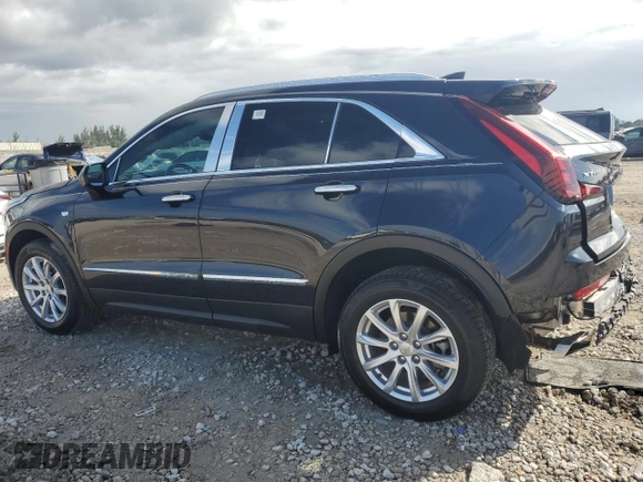 2023 Cadillac XT4 FWD Luxury with VIN 1GYAZAR4XPF104311, listed as a Copart auction lot 46891635 with 28,972 mi miles and Non repairable. Bid and sale history available at DreamBid. Image 2.