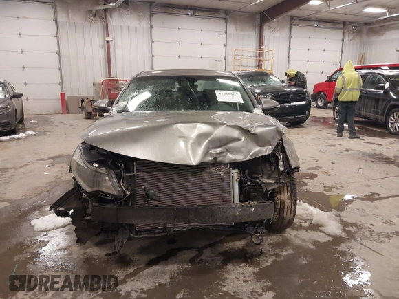 2017 Kia Optima LX with VIN 5XXGT4L33HG148897, listed as a IAAI auction lot 41565592 with 61,471 mi miles and . Bid and sale history available at carsss.com. Image 13.