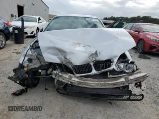 2002 BMW 3 Series 330i with VIN WBAEV53472KM01780, listed as a Copart auction lot 80667794 with 0 mi miles and Salvage Title. Bid and sale history available at carsss.com. Image 5.