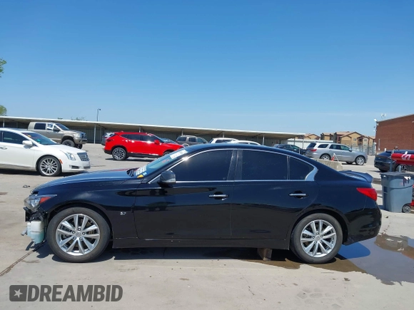 2015 Infiniti Q50 Premium with VIN JN1BV7AP9FM355526, listed as a IAAI auction lot 42010401 with 67,131 mi miles. Bid and sale history available at carsss.com. Image 15.