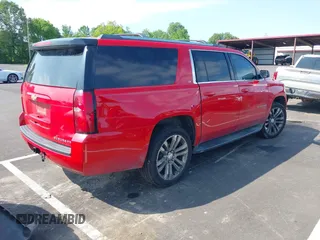 2015 Chevrolet Suburban LT with VIN 1GNSCJKC8FR291713, listed as a IAAI auction lot 42323281 with 226,708 mi miles and . Bid and sale history available at DreamBid. Image 4.