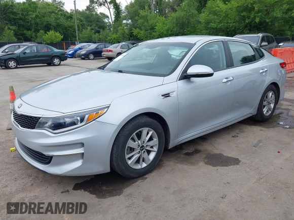 2017 Kia Optima LX with VIN KNAGT4L37H5157247, listed as a IAAI auction lot 42497025 with 154,721 mi miles and . Bid and sale history available at DreamBid. Image 2.