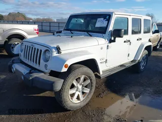 2017 Jeep Wrangler Unlimited Sahara with VIN 1C4BJWEG0HL587163, listed as a IAAI auction lot 41252399 with 84,983 mi miles. Bid and sale history available at carsss.com. Image 17.