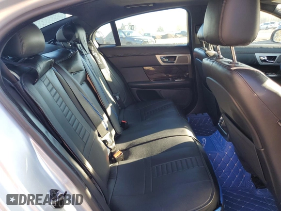 2015 Jaguar XF V6 Portfolio with VIN SAJWA0F7XF8U51105, listed as a Copart auction lot 82865814 with 62,807 mi miles and Salvage Title. Bid and sale history available at carsss.com. Image 10.
