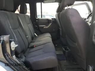 2015 Jeep Wrangler Unlimited Sport with VIN 1C4BJWDG1FL668395, listed as a Copart auction lot 64035035 with 79,972 mi miles and Salvage title. Bid and sale history available at DreamBid. Image 10.