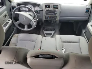 2006 Dodge Dakota SLT z VIN 1D7HW48N56S641575, wystawiony jako Copart lot #60141125 z przebiegiem 135 482 mil mil oraz Szkoda całkowita • Salvage title. Historia ofert i sprzedaży dostępna na DreamBid. Obrazek 8.