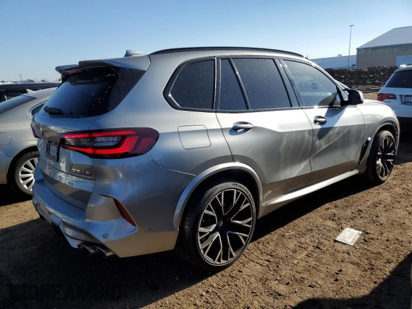 2021 BMW X5 M with VIN 5YMJU0C01M9F10602, listed as a Copart auction lot 65668883 with 23,214 mi miles. Bid and sale history available at carsss.com. Image 3.
