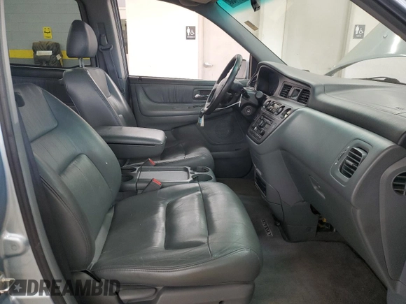 2004 Honda Odyssey EX-L z VIN 5FNRL18044B020316, wystawiony jako Copart lot #56027435 z przebiegiem 192 429 mil mil oraz Szkoda całkowita • Salvage title. Historia ofert i sprzedaży dostępna na DreamBid. Obrazek 7.