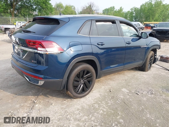2022 Volkswagen Atlas SE z VIN 1V2KC2CA9NC216742, wystawiony jako IAAI lot #42406428 z przebiegiem 34 598 mil mil oraz . Historia ofert i sprzedaży dostępna na DreamBid. Obrazek 4.