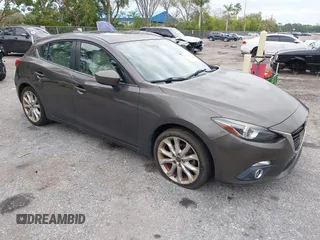 2015 Mazda 3 S Grand Touring with VIN JM1BM1M35F1264244, listed as a IAAI auction lot 41674683 with 119,684 mi miles and . Bid and sale history available at DreamBid. Image 1.