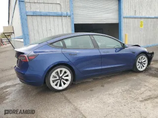 2023 Tesla Model 3 with VIN 5YJ3E1EA3PF456222, listed as a Copart auction lot 51690025 with 90,548 mi miles and Salvage Title. Bid and sale history available at carsss.com. Image 3.