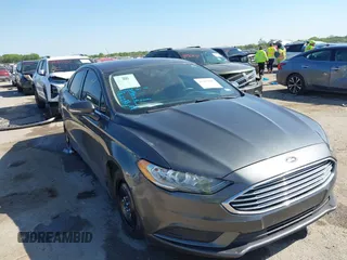 2017 Ford Fusion SE z VIN 3FA6P0H79HR412250, wystawiony jako IAAI lot #41984265 z przebiegiem 108 106 mil mil oraz . Historia ofert i sprzedaży dostępna na DreamBid. Obrazek 1.
