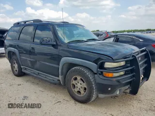 2001 Chevrolet Tahoe LT with VIN 1GNEK13T11R207478, listed as a Copart auction lot 54766815 with 301,575 mi miles and Salvage title. Bid and sale history available at DreamBid. Image 4.
