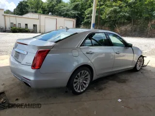 2014 Cadillac CTS Performance RWD with VIN 1G6AS5SX5E0140562, listed as a Copart auction lot 64336615 with 86,564 mi miles and Salvage title. Bid and sale history available at DreamBid. Image 3.