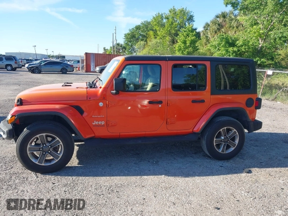 2018 Jeep Wrangler Unlimited Sahara with VIN 1C4HJXEG3JW323634, listed as a IAAI auction lot 41853471 with 126,531 mi miles. Bid and sale history available at carsss.com. Image 14.