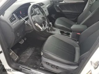 2022 Volkswagen Tiguan SE R-Line Black with VIN 3VVCB7AX0NM169257, listed as a Copart auction lot 43129745 with 59,517 mi miles and Salvage Title. Bid and sale history available at carsss.com. Image 7.