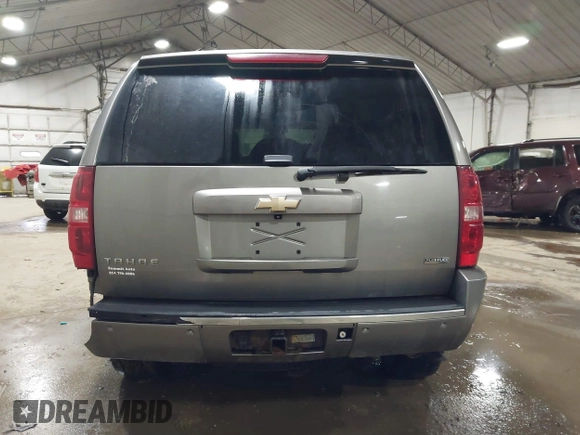 2009 Chevrolet Tahoe LTZ with VIN 1GNFK33049R143390, listed as a IAAI auction lot 41747041 with 209,492 mi miles and . Bid and sale history available at DreamBid. Image 16.