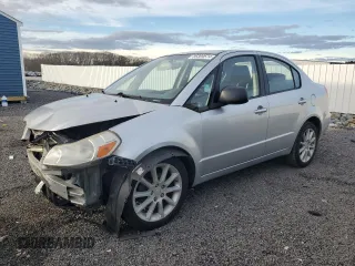 2011 Suzuki SX4 LE with VIN JS2YC5A23B6300189, listed as a Copart auction lot 85389574 with 71,272 mi miles and Clean Title. Bid and sale history available at carsss.com. Image 1.