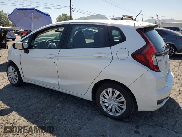 2020 Honda Fit LX with VIN 3HGGK5H49LM720025, listed as a Copart auction lot 52760585 with 140,762 mi miles and Salvage title. Bid and sale history available at DreamBid. Image 2.