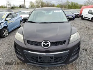 2010 Mazda CX-7 SV z VIN JM3ER2WMXA0341433, wystawiony jako Copart lot #53474815 z przebiegiem 106 410 mil mil oraz Czysty tytuł • Clean title. Historia ofert i sprzedaży dostępna na DreamBid. Obrazek 5.