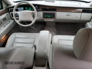 1995 Cadillac DeVille z VIN 1G6KD52B8SU274053, wystawiony jako Copart lot #86429934 z przebiegiem 100 496 mil mil oraz Szkoda całkowita • Salvage title. Historia ofert i sprzedaży dostępna na DreamBid. Obrazek 8.