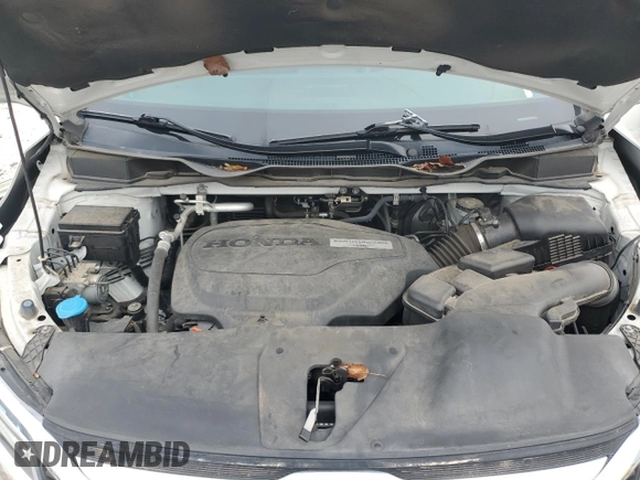 2020 Honda Odyssey Touring with VIN 5FNRL6H88LB014164, listed as a Copart auction lot 42925415 with 67,667 mi miles and Salvage title. Bid and sale history available at DreamBid. Image 12.