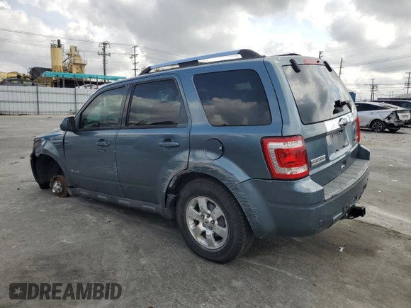 2010 Ford Escape Hybrid with VIN 1FMCU4K30AKC51022, listed as a Copart auction lot 51014615 with 128,275 mi miles and Salvage title. Bid and sale history available at DreamBid. Image 2.