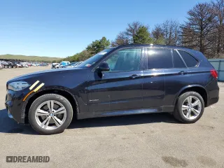 2014 BMW X5 xDrive50i with VIN 5UXKR6C5XE0J72051, listed as a Copart auction lot 50869574 with 129,875 mi miles and Salvage Title. Bid and sale history available at carsss.com. Image 1.