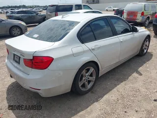 2013 BMW 3 Series 328i with VIN WBA3A5C5XDJ461783, listed as a IAAI auction lot 42150355 with 115,992 mi miles and . Bid and sale history available at DreamBid. Image 4.