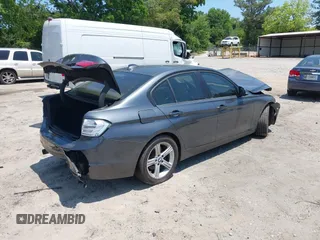 2013 BMW 3 Series 320i with VIN WBA3B1C50DK130310, listed as a IAAI auction lot 42341291 with 176,000 mi miles and . Bid and sale history available at DreamBid. Image 4.