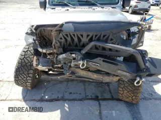 2021 Jeep Wrangler Unlimited Willys z VIN 1C4HJXDN6MW590786, wystawiony jako Copart lot #52903845 z przebiegiem Nie podano mil oraz Szkoda całkowita • Salvage title. Historia ofert i sprzedaży dostępna na DreamBid. Obrazek 13.
