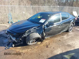 2019 Toyota Camry LE z VIN 4T1B11HK7KU774951, wystawiony jako IAAI lot #41349009 z przebiegiem 189 711 mil mil oraz . Historia ofert i sprzedaży dostępna na DreamBid. Obrazek 18.