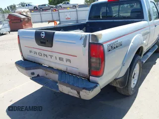 2001 Nissan Frontier SE Desert Runner z VIN 1N6ED26T51C362345, wystawiony jako IAAI lot #42324055 z przebiegiem 233 809 mil mil oraz . Historia ofert i sprzedaży dostępna na DreamBid. Obrazek 14.
