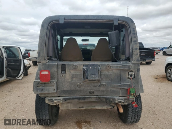 1998 Jeep Wrangler Sahara with VIN 1J4FY49S0WP749826, listed as a Copart auction lot 55174205 with 203,574 mi miles and Salvage title. Bid and sale history available at DreamBid. Image 6.
